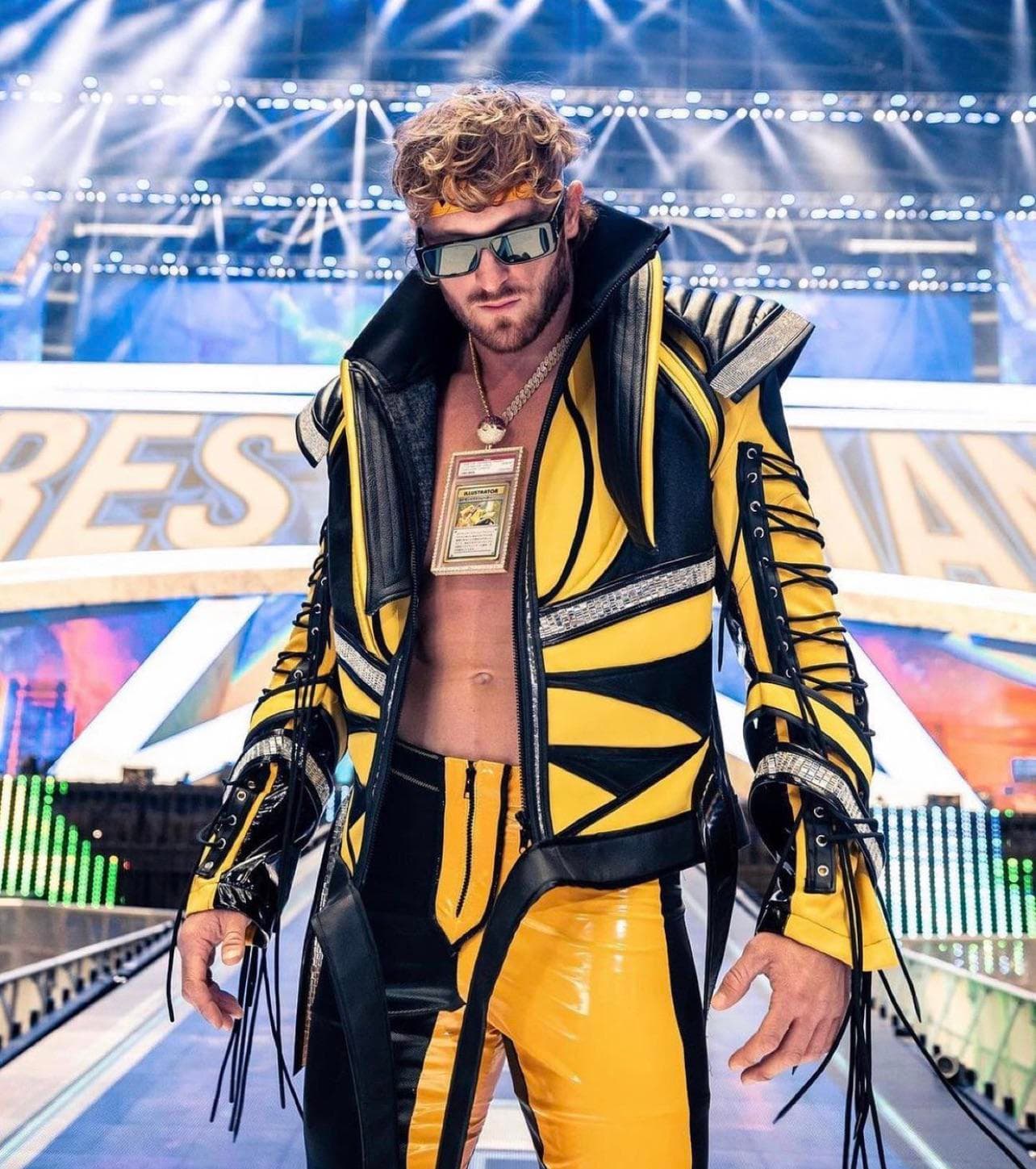 Logan Paul wearing the PSA 10 Pikachu Illustrator card around his neck